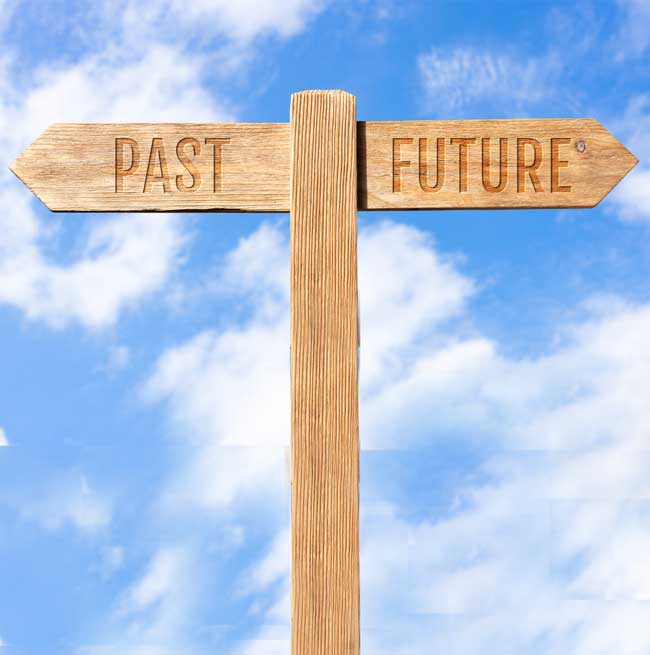 image of sign showing past and future directions